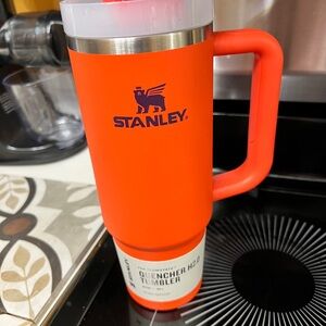 Stanley Bright Orange Travel Tumbler with Navy Logo